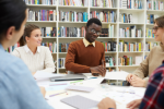 meeting around table in library 150x100.png